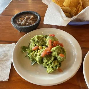 Fresh guacamole and salsa and their street tacos