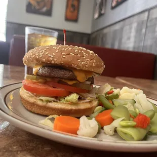 Hamburger with side of steamed veggies
