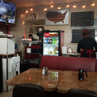 a woman standing at the counter