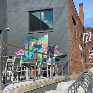 a colorful mural on the side of a building
