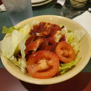 Salad with tomato basil dressing.
