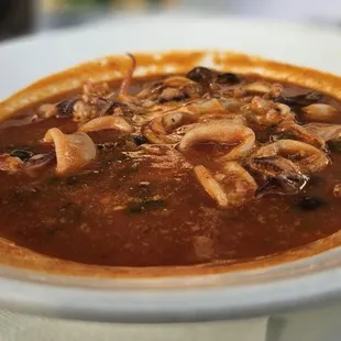 Calamari in tomatoe based broth.  Delicious
