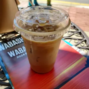 Iced decaf coffee with coconut milk.