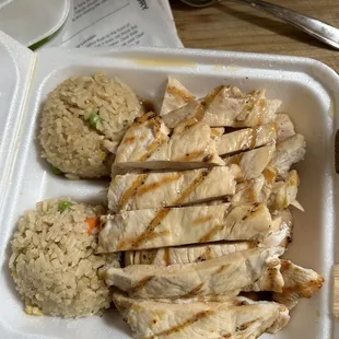 chicken and rice in a styrofoam container