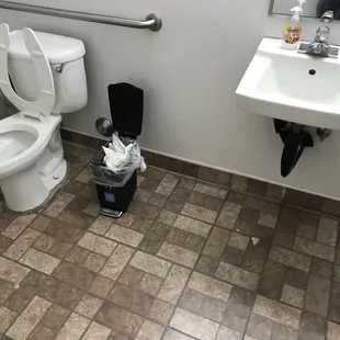 One unisex bathroom. Appears to get cleaned multiple times a day.