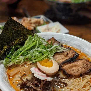 a bowl of ramen with a boiled egg