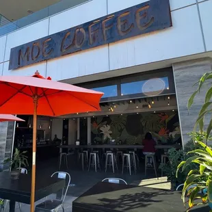 Inside/outside connects and has a glass wall to separate when it's rainy