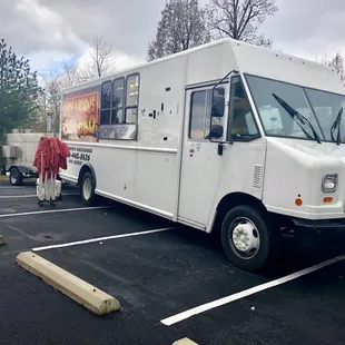 a food truck parked in a parking lot