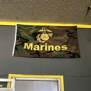 Marine flag on top of door entrance....