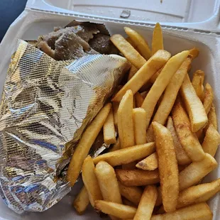 Gyro (without lettuce and tomato) and french fries.
