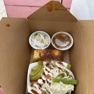 Bama pulled pork, ribs, coleslaw, baked beans and cornbread