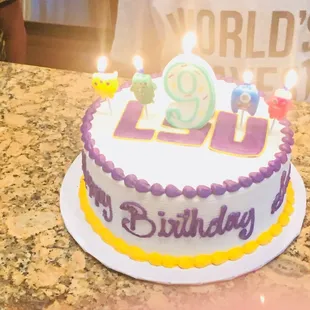 a birthday cake with candles