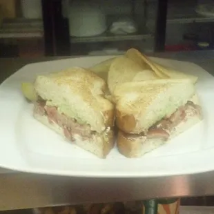 Sauteed Strawberry, Avacado, and Goat Cheese Sandwich. Don't judge, it sounds weird but its delicious!