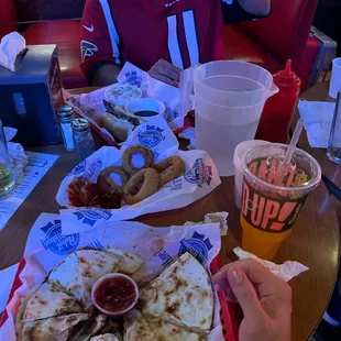 a man sitting at a table with food