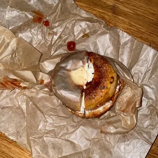 In toasted bagel with jelly and badger milk