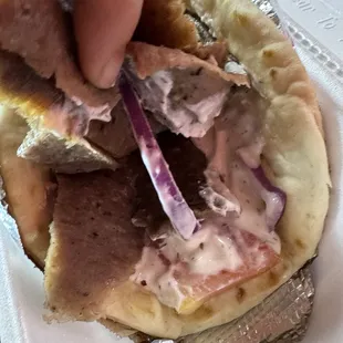 7. Gyro Sandwich with all the toppings hidden under