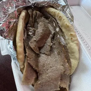 7. Gyro Sandwich (toppings under meat and under done)