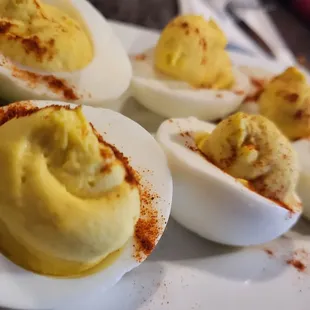 deviled eggs on a white plate