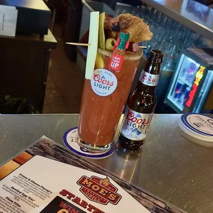 a bloody drink and a menu