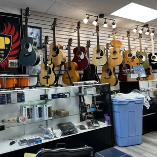 Large selection of guitars.