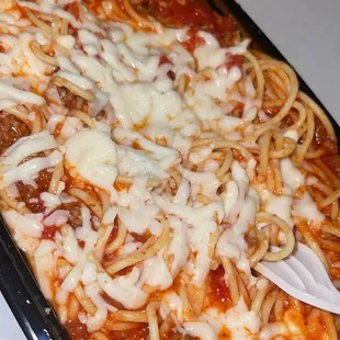 Spaghetti Bolognese with mozzarella cheese on top 7/10.