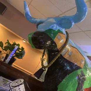 a colorful cow statue