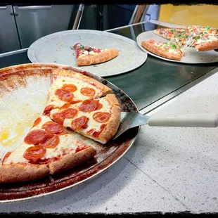 a slice of pepperoni pizza