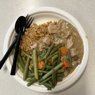 Spanish rice, pork chili verde with steamed veggies