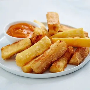  a plate of french fries with ketchup