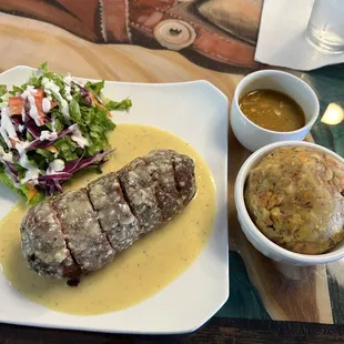 Stuffed chicken with amazing greens and Mofongo with some real awesome sauce. I'm learning Spanish for the cuisine !! #NoLetdown