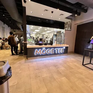 a group of people in a cafe