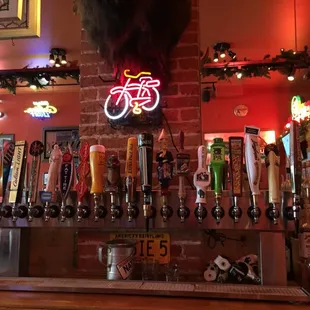 a bar with beer taps