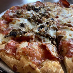 Small (9.99) pepperoni pizza with mushrooms on my half. I wanted to love her so much
