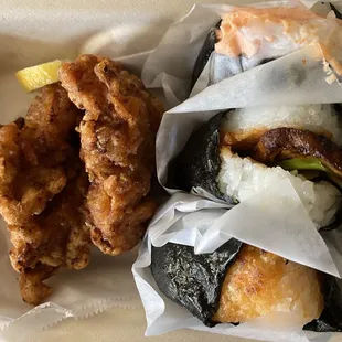 Chicken Karaage, Mentaiko with Tamago, Grilled Salmon with Shiso Leaf, and Buta Kakuni with Spicy Miso Onigiris