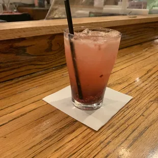 a drink on a wooden table