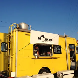 a yellow food truck