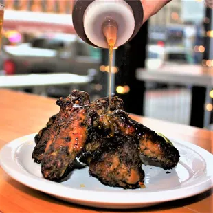 Smoked chicken wings, chimichurri, chili-infused honey, lime.