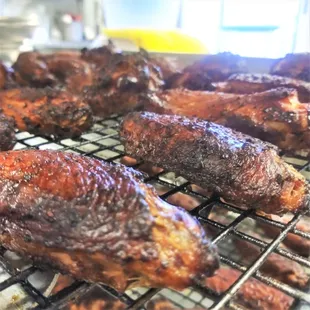 Chicken wings pulled from the smoker.