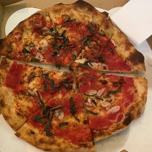 Rosa pizza with shaved garlic, basil, tomato to go for $9