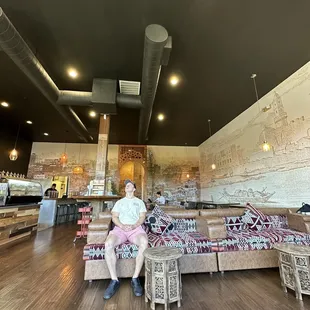 Overall inside - lots of seating/tables and chairs behind