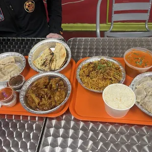 Lamb Biryani, C Momo, Garlic Naan, Chicken Tikka Masala, Beef Momo, Onion Pakora