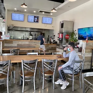 a woman sitting at a table