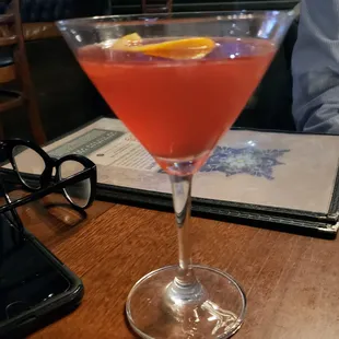 Blood orange martini, mixed strong according to the person who ordered it