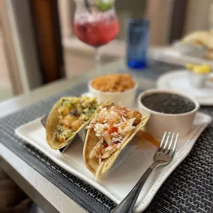 Lunch menu. Two tacos (Shrimp tempura &amp; Salmon) rice and beans