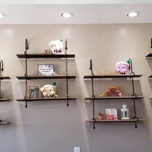 a wall of shelves with various items