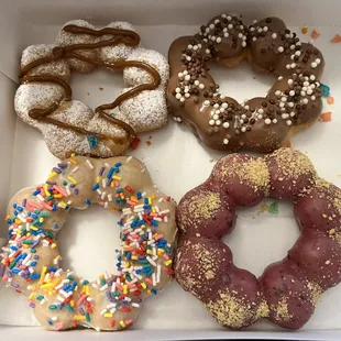 I was too excited and ate two before taking this pic. TL is unknown, TR is Chocolate crunch, BR is Blueberry, and BL is Funfetti.