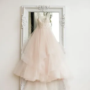 Photo of blush wedding gown in the gallery event space in Kansas City MO