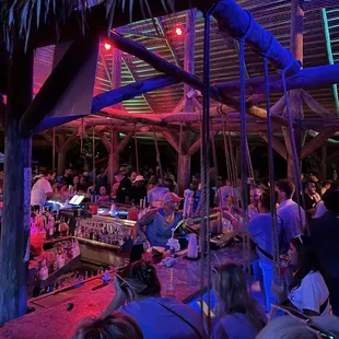 a large group of people at a bar