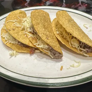 Three hard tacos.