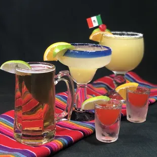 a mexican cocktail with a mexican flag garnish